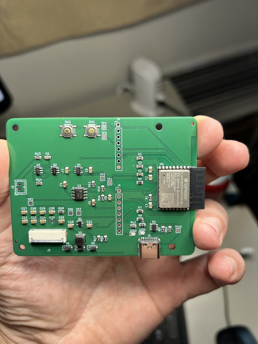 Bare circuit board in a hand